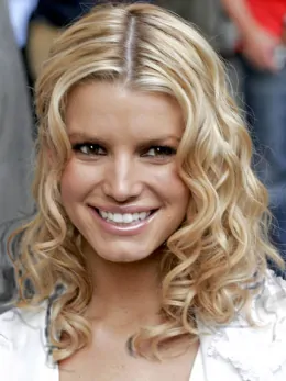 Jessica Simpson stunning shoulder-length layered wavy lace wig about 14  inches